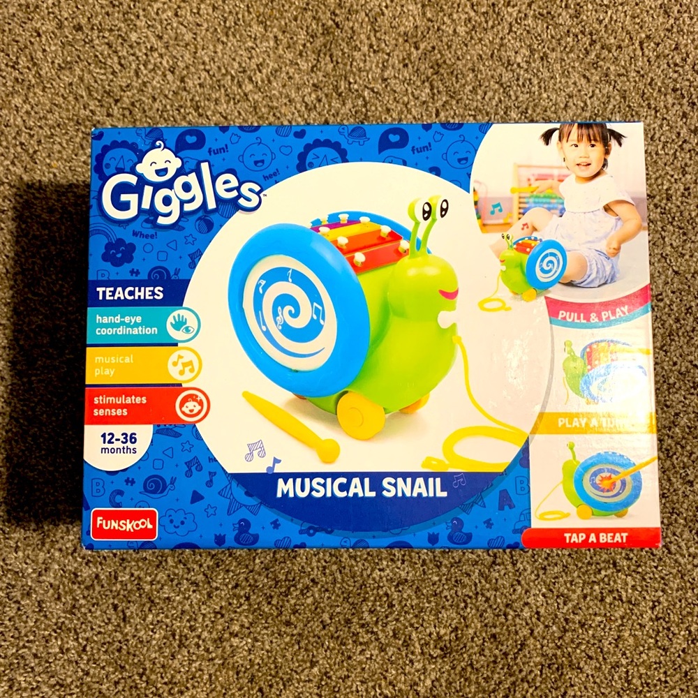 Giggles Musical Snail hand-eye coordination toy
